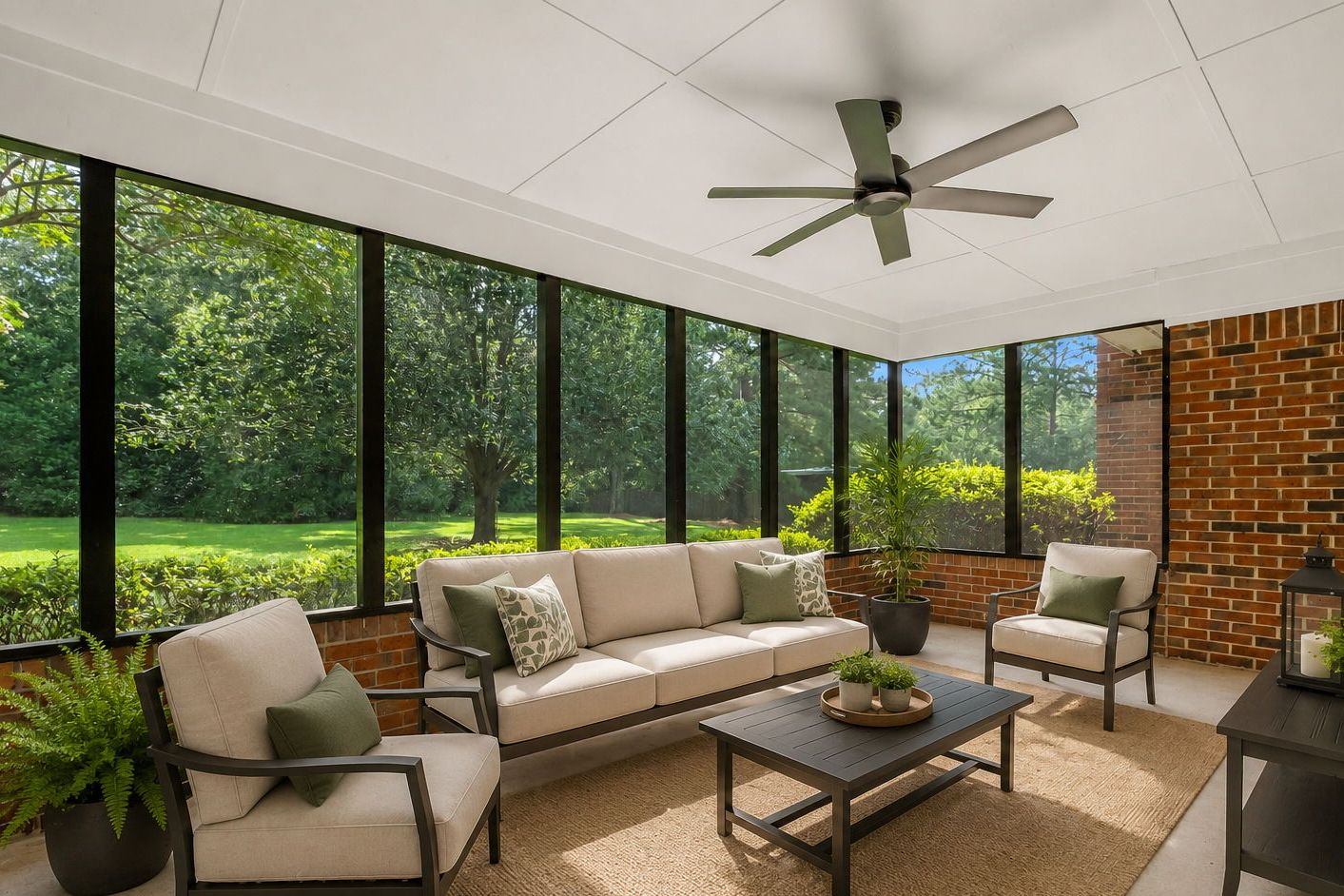 Screened back porch, virtually staged, looking out over the lawn